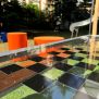 HPL Bench Chess and ludo game üzerinde siyah ve turuncu kareli oyun alanı ve turuncu oturma birimleri.